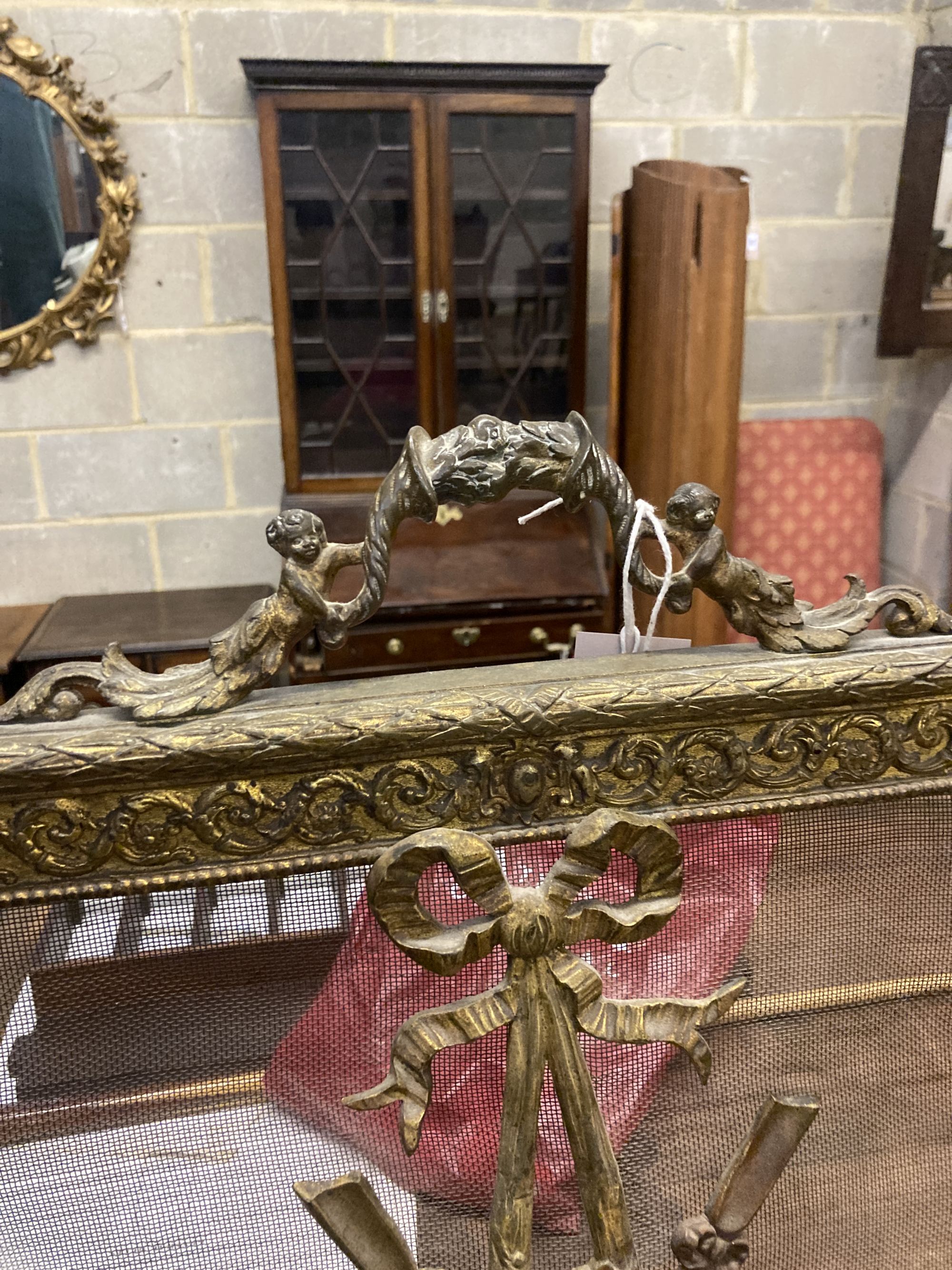 An ormolu fire guard, width 55cm, height 79cm